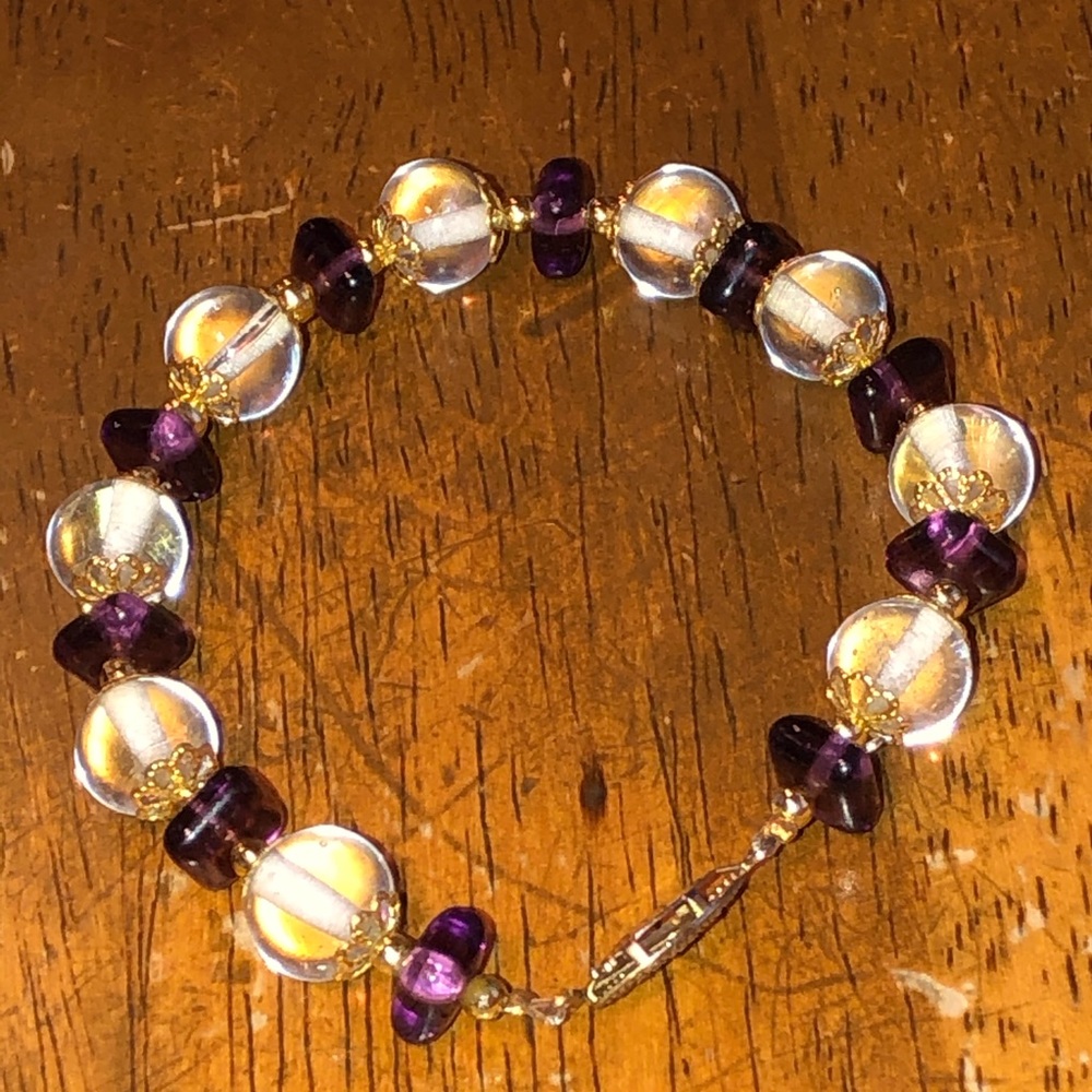 Purple, clear, and gold glass bead bracelet